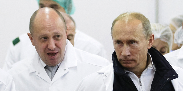 Jewgeni Prigozhin, links, mit dem russischen Präsidenten Wladimir Putin.