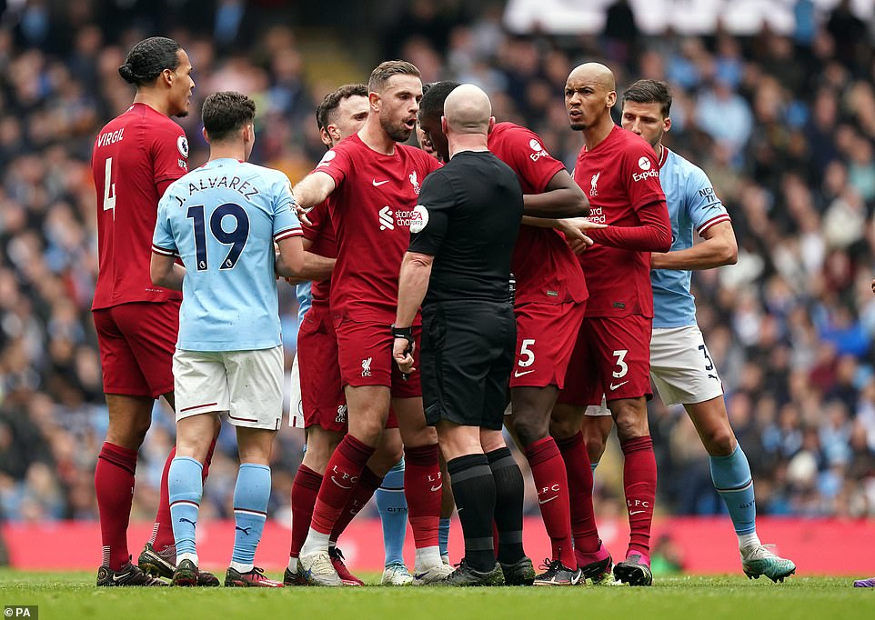 It was a heated first-half and Liverpool players were unhappy that Simon Hooper didn't show Rodri a second yellow card