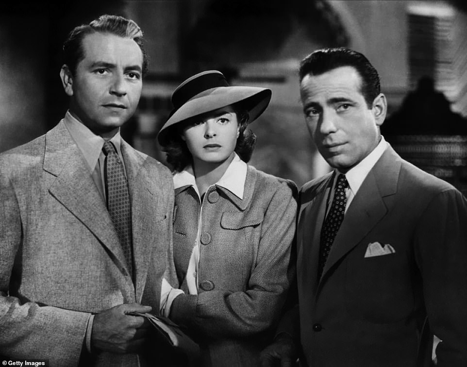 Actors Humphrey Bogart, Paul Henreid and Ingrid Bergman pose for a publicity still for the Warner Bros film Casablanca