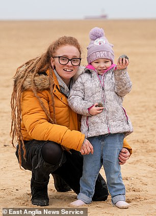 Kayleigh Hurst and daughter Lola, two, on the beach at Gorleston-on-Sea, Norfolk, this week