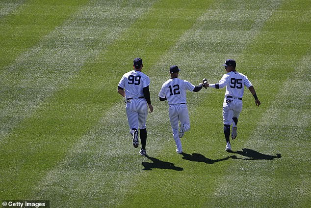 Aaron Judge, Isiah Kiner-Falefa and Oswaldo Cabrera are seen in the outfield Sunday