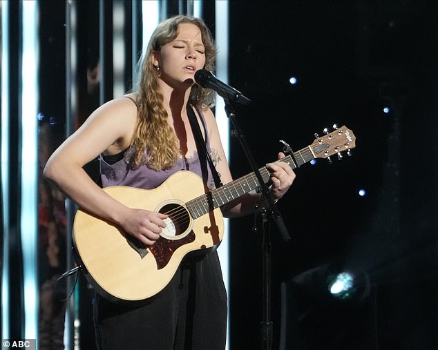 Original: The 24-year-old recruiter from Houston, Texas sang her original song for the judges, as they revealed Zachariah, Hannah and Mary Beth were all moving through, as Zachariah joked he, 'might be out of the burger business'