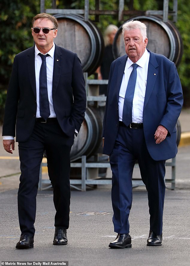 Former Sony Music Australia boss Denis Handlin (right) appeared among the mourners
