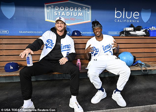 KSI (right) pictured with American Youtuber Logan Paul in the dugout prior to a baseball game between the Los Angeles Dodgers and the Arizona Diamondbacks