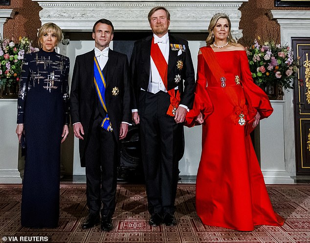 Maxima donned a stunning bright red dress as she and her husband welcomed their guests today