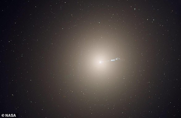 The elliptical galaxy Messier 87 (M87) is the home of several trillion stars, a supermassive black hole and a family of roughly 15,000 globular star clusters. This Hubble image is a composite of individual observations in visible and infrared light
