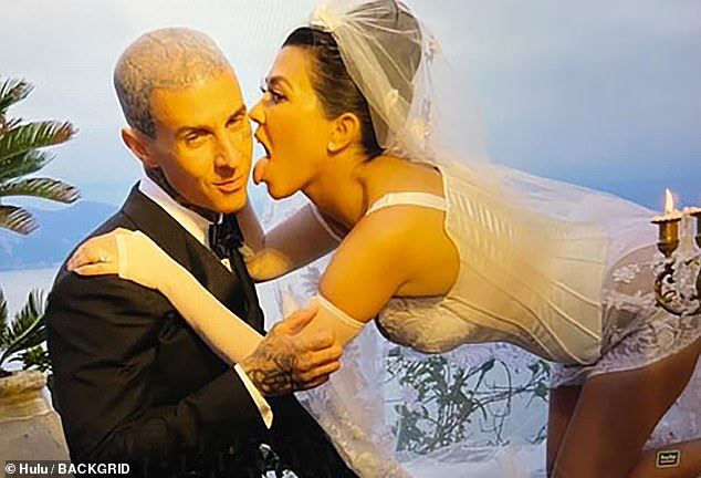 Newlyweds: While she and her husband Travis Barker ultimately released a special on Hulu, called ‘Til Death Do Us Part Kourtney & Travis, comprised of raw footage from their nuptials in Portofino, Italy, the reality star, 43, raved about the freedom of recording the event without the 'intention of anyone every seeing it'