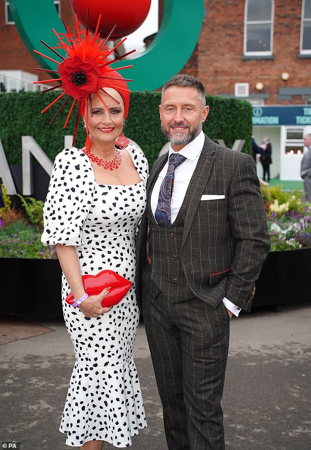 Perfect pairing! This couple looked sharp and smart in a three piece suit and dalmatian printed frock - with a spiked poppy fascinator to catch attention