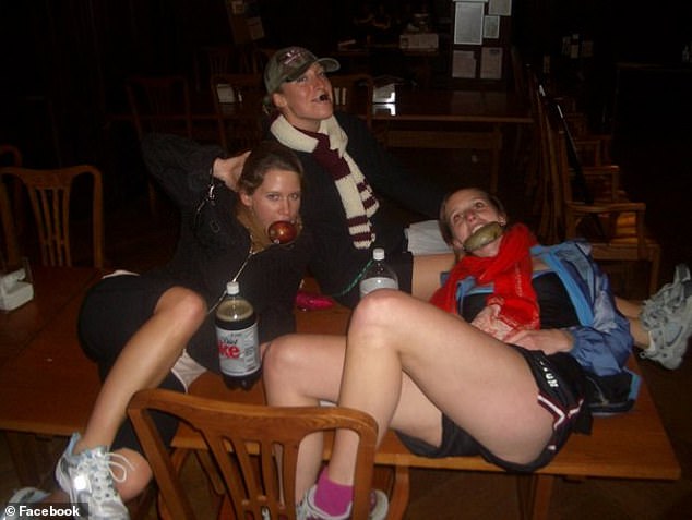 Alissa Heinerscheid (right), vice president of marketing for Budweiser, was seen in a series of leaked photos from 2005 at a Harvard social club event downing bottles of beer