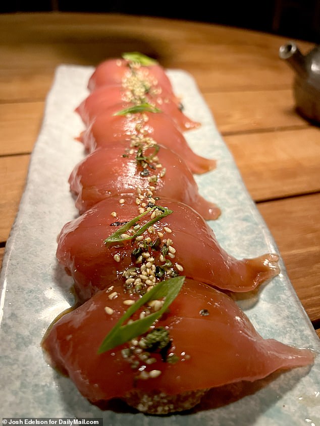 Eine Thunfisch-Sashimi-Vorspeise.  Ein Drei-Gänge-Menü im Signature-Restaurant kostet etwa 150 US-Dollar pro Person