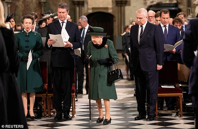 The late Queen made the decision the previous January after the Duke of York, 63, was accused by Virginia Giuffre of sexual abuse relating to his associations with Jeffrey Epstein. Queen Elizabeth II is pictured with Prince Andrew at a service of thanksgiving for late Prince Philip, Duke of Edinburgh, at Westminster Abbey in London, Britain, March 29, 2022