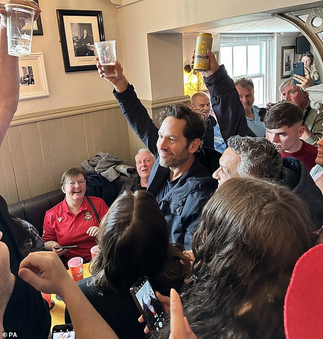 Cheers! Plenty of fans stopped the Hollywood A-lister for a selfie, and his arrival even caused 'Paul Rudd' to trend on Twitter