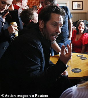 Team talk: Paul chatted to Wrexham fans in the local pub ahead of the 6.30pm kick off
