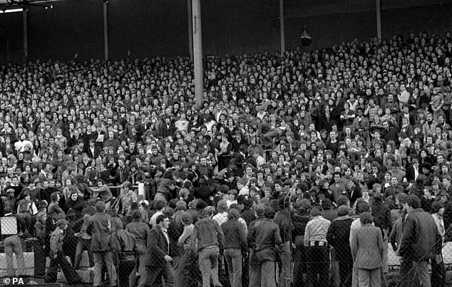 Bob has recounted the toughest firm he ever faced - which saw him surrounded by an army of 2,000 thugs. Pictured is a brawl between before the start of Chelsea's League Division Two promotion battle against Millwall at Stamford Bridge in 1988