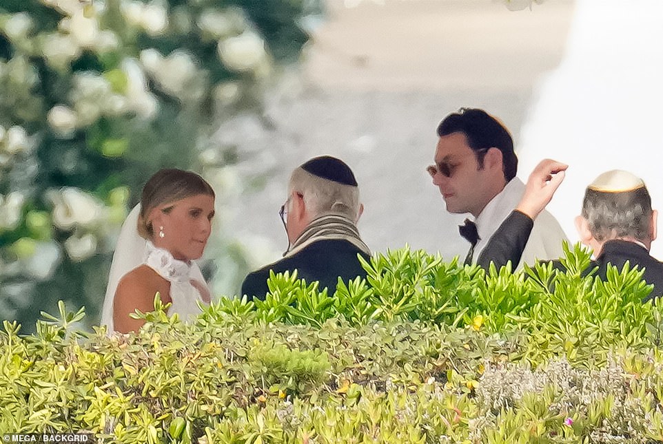Tradition: The couple were wed in a traditional Jewish manner, with a Rabbi leading the ceremony