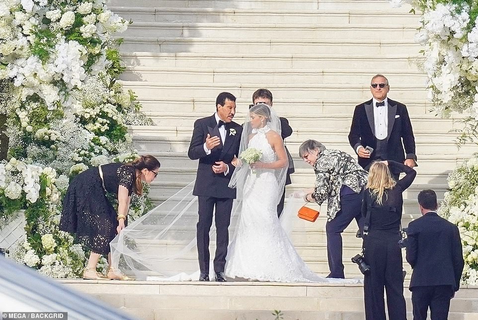 Glammed up: A photographer documented Sofia's every move as she made her way to the aisle