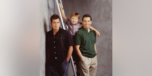 Charlie Sheen, Angus T. Jones and John Cryer in a promotional shot for "Two and a Half Men."