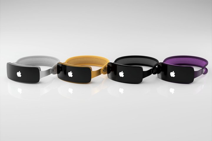 Ein Rendering von vier Apple Mixed-Reality-Headsets (Reality Pro) in verschiedenen Farben, die auf einer Oberfläche sitzen.