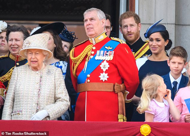 The Queen's decision to strip Prince Andrew of his HRH and military titles following his settlement of a lawsuit over alleged sexual abuse was her 'final gesture of self-sacrifice', a documentary has claimed. Pictured: Queen Elizabeth II, Prince Andrew, Prince Harry and Meghan Duchess of Sussex in June 2019