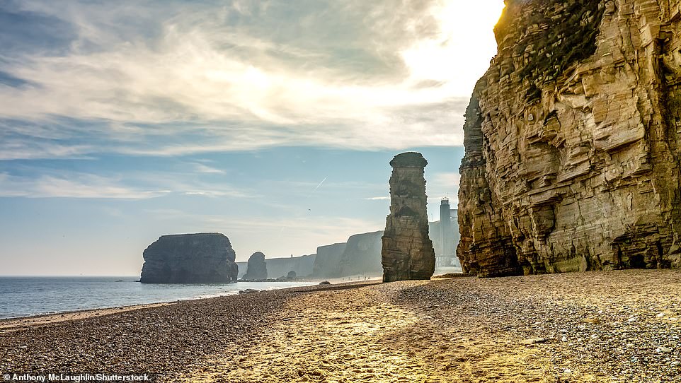 MARSDEN BAY, SOUTH TYNESIDE: This 'beautiful bay' has 'dramatic cliffs, sea stacks, caves and Marsden Rock [the rock formation in the sea on the left]'. The author reveals that the bay is also 'home to one of England's most important seabird colonies with thousands of fulmars, kittiwakes, cormorants and gulls'. The book continues: 'Above the bay is The Leas, a long stretch of grassy land for kite-flying, walks and cycling.' Co-ordinates: 54.9785, -1.3783