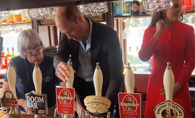 Once inside the pub, Prince William tried his hand at pulling a pint under the watchful eye of a member of staff