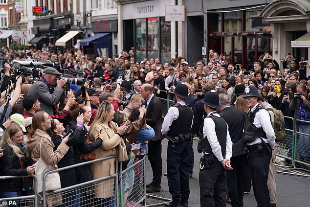 Excited fans gathered in the street in large crowds in Soho to catch a glimpse of the couple ahead of the visit