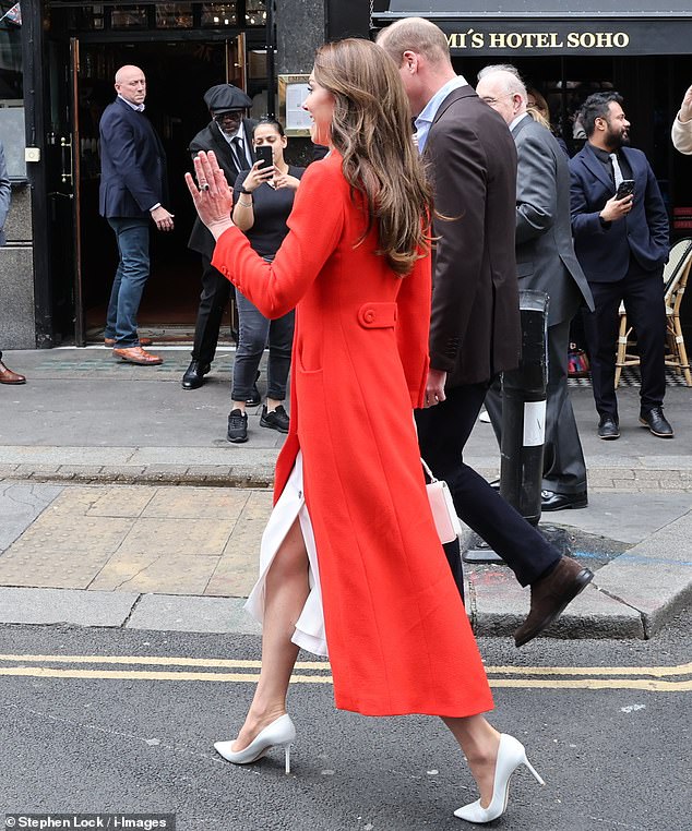 Kate and William waved to excited royal fans as they arrived in Soho for the engagement today (pictured)