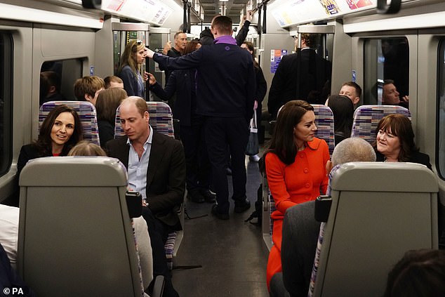 Surprise! The royals appeared utterly at home on the public transport as they chatted with members of staff