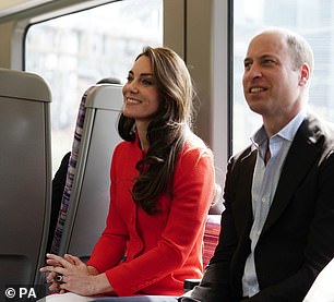 The Prince and Princess of Wales were beaming as they travelled on the new underground line today, which was opened in honour of the late Queen