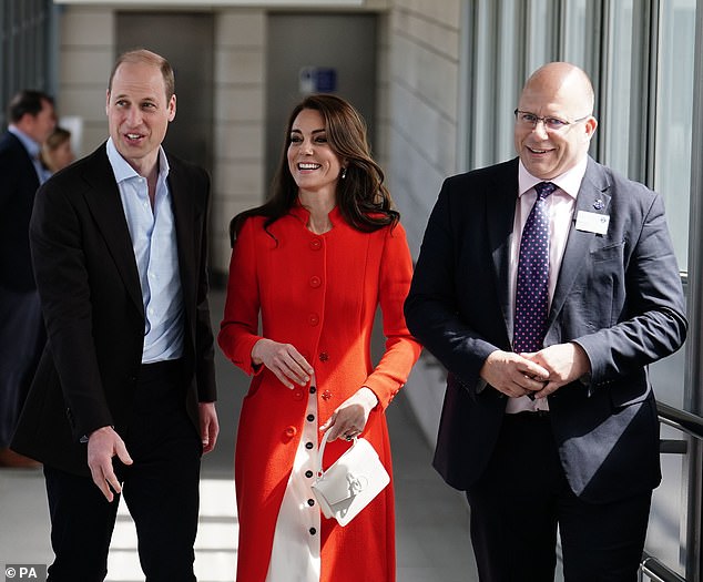 Prince William and Kate appeared to get into the party spirit as they took the Elizabeth Line to the engagement today