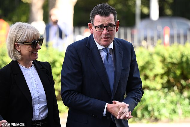 Victorian Premier Dan Andrews and his wife Catherine are seen arriving at the service