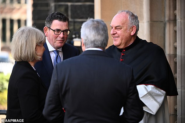 Mr Andrews was seen greeting Melbourne Archbishop Peter Comensoli before the service