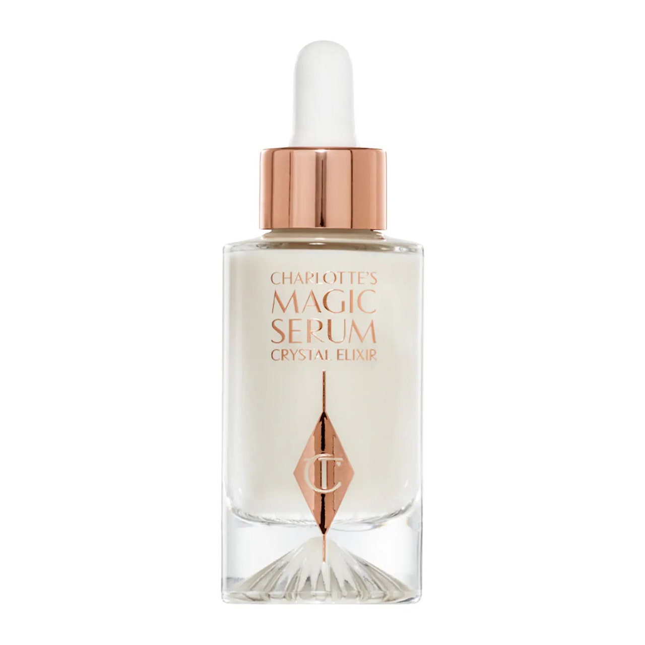 Charlotte Tilbury Magic Serum Crystal Elixir klare Flasche mit weißem Serum mit weißer und roségoldener Kappe auf weißem Hintergrund