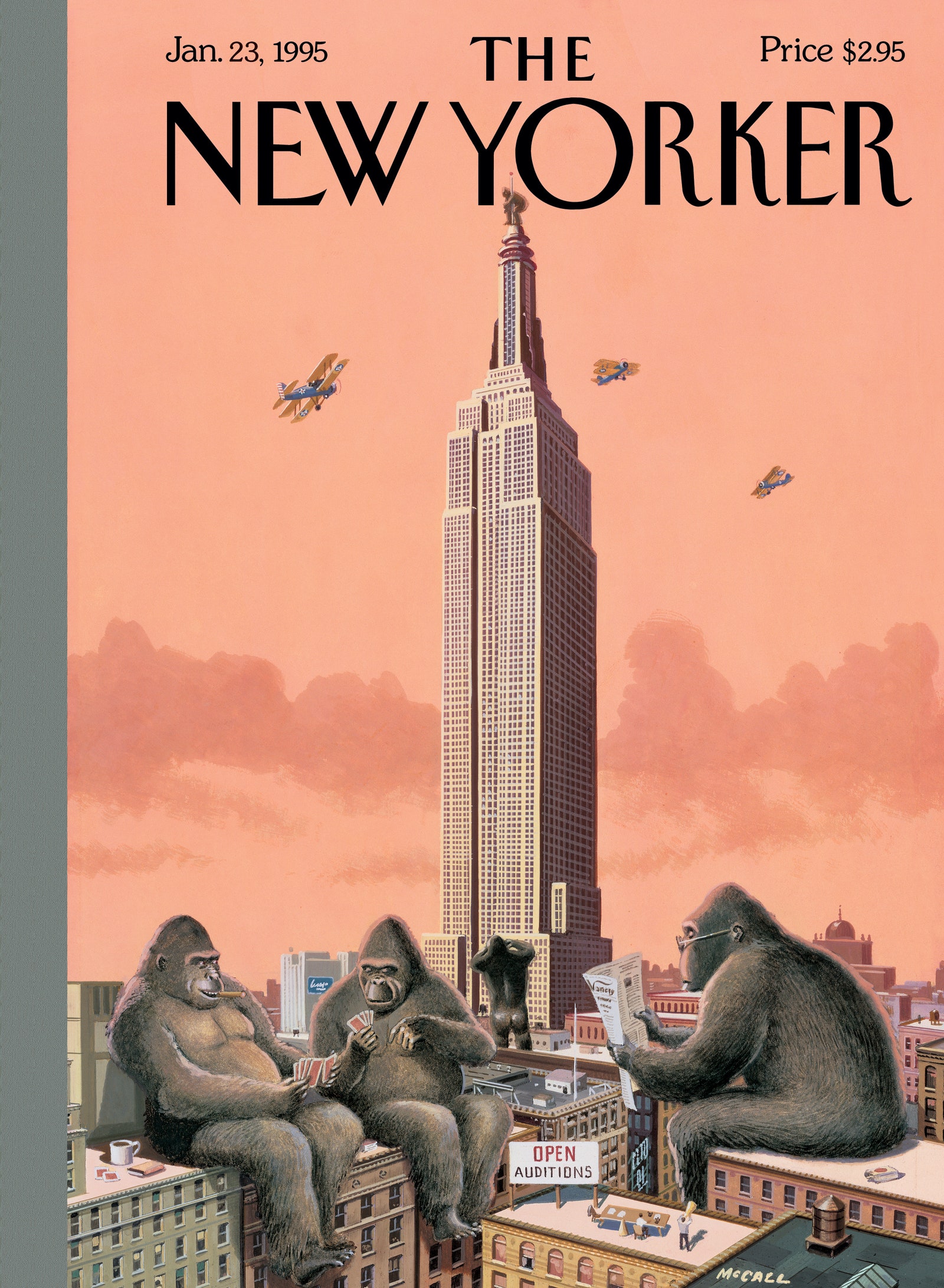 Eine Gruppe von Gorillas lungert auf Gebäuden in der Nähe des Empire State Building.  Einer liest eine Zeitung.