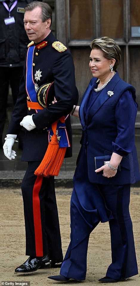 Grand-Duke Henri of Luxembourg donned ceremonial military garb for the event. Meanwhile his wife Maria Teresa opted for a trouser suit in midnight blue
