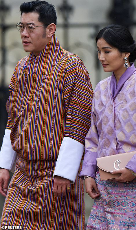 Queen Jetsun Pema was elegant in a full length purple gown, and co-ording nude accessories