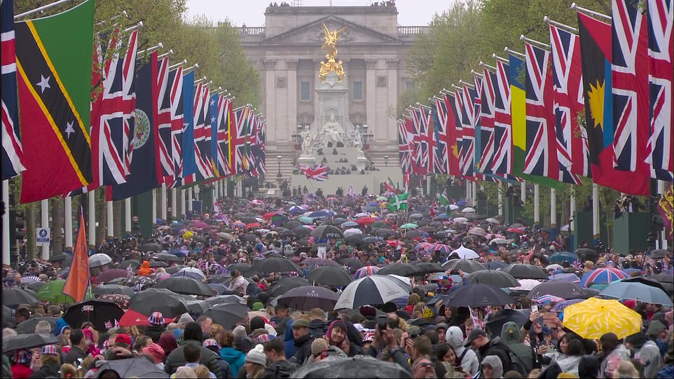 Huge crowds head for Buckingham Palace to catch a glimpse of the King and Queen