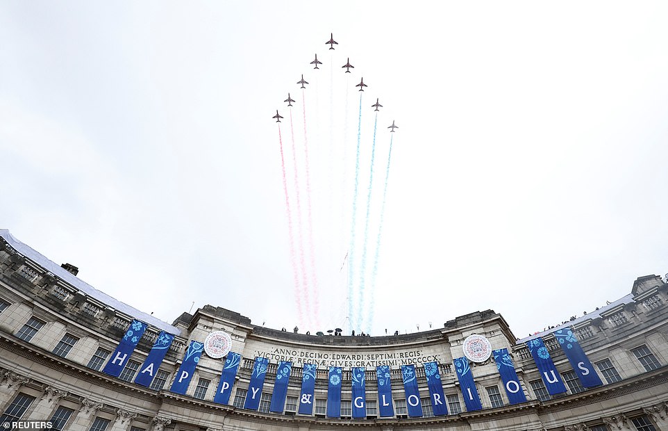 Red Arrows fly by the Admiralty Arch