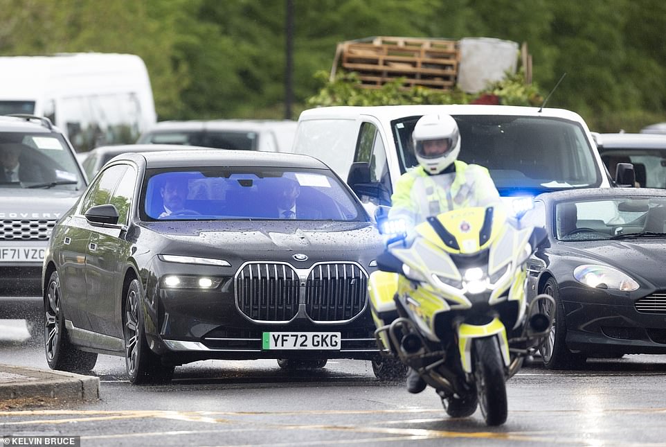 Prince Harry leaves London with a police escort