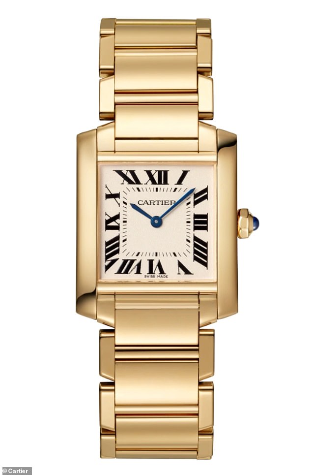 Meghan trug die Cartier Tank Uhr, wie abgebildet, ein Geschenk von Harry, das einst Prinzessin Diana gehörte