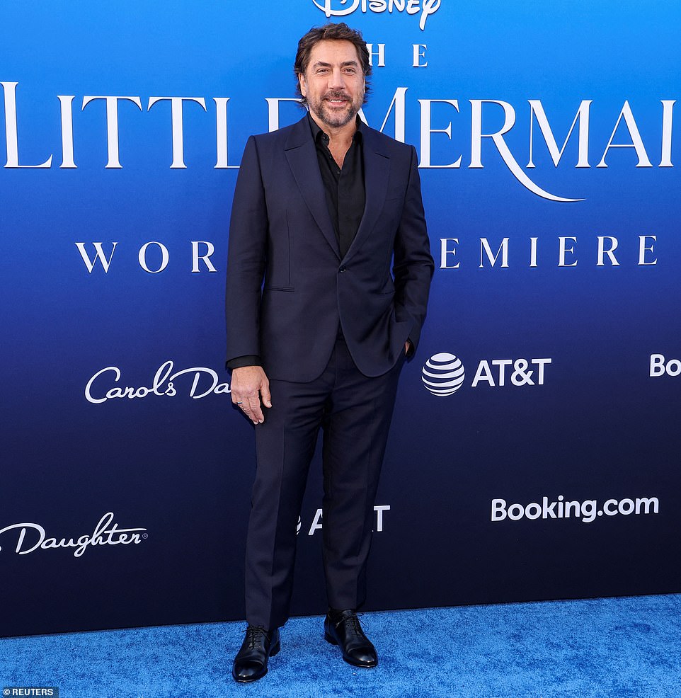 All hail King Triton: Javier Bardem, 54, was classically handsome in his tailored suit. The Oscar winner plays Ariel's father King Triton