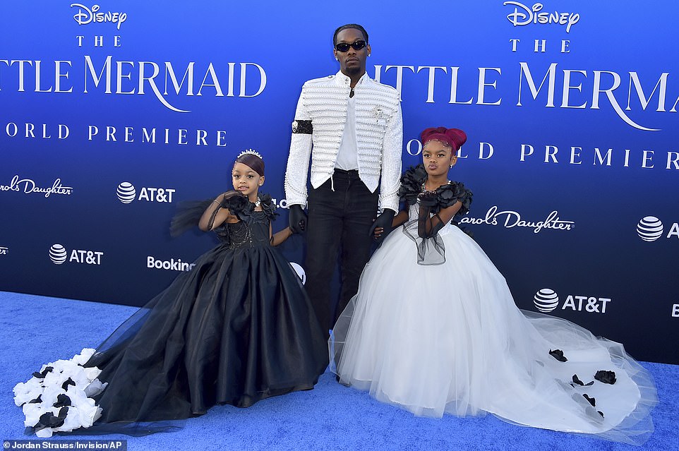 The rapper brought along his two daughters who stole the show in their black and white princess gowns