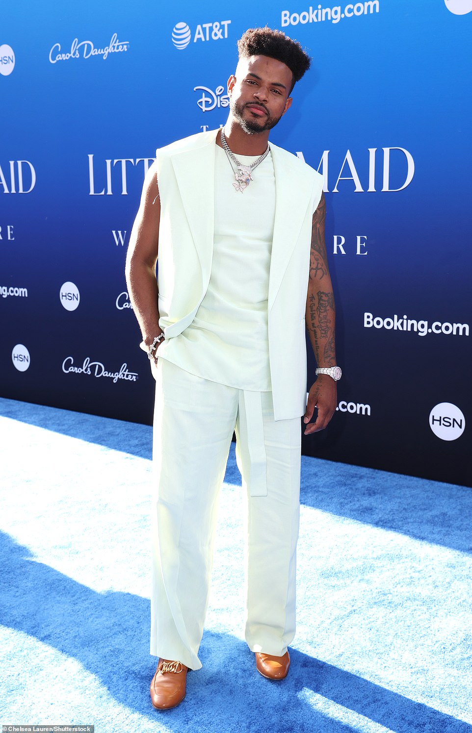 Trevor Jackson looked dapper in a sleeveless white look