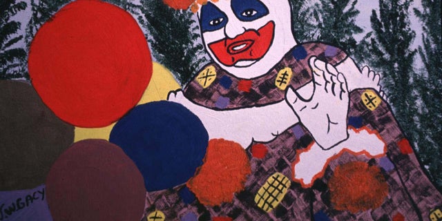 Ein Foto von John Wayne Gacys gemaltem Selbstporträt im Clownkostüm