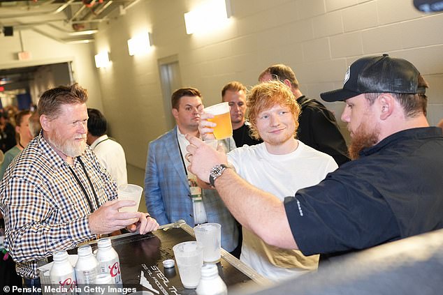 Drinking up: Ed Sheeran was spotted having a beer at the 58th Academy of Country Music Awards