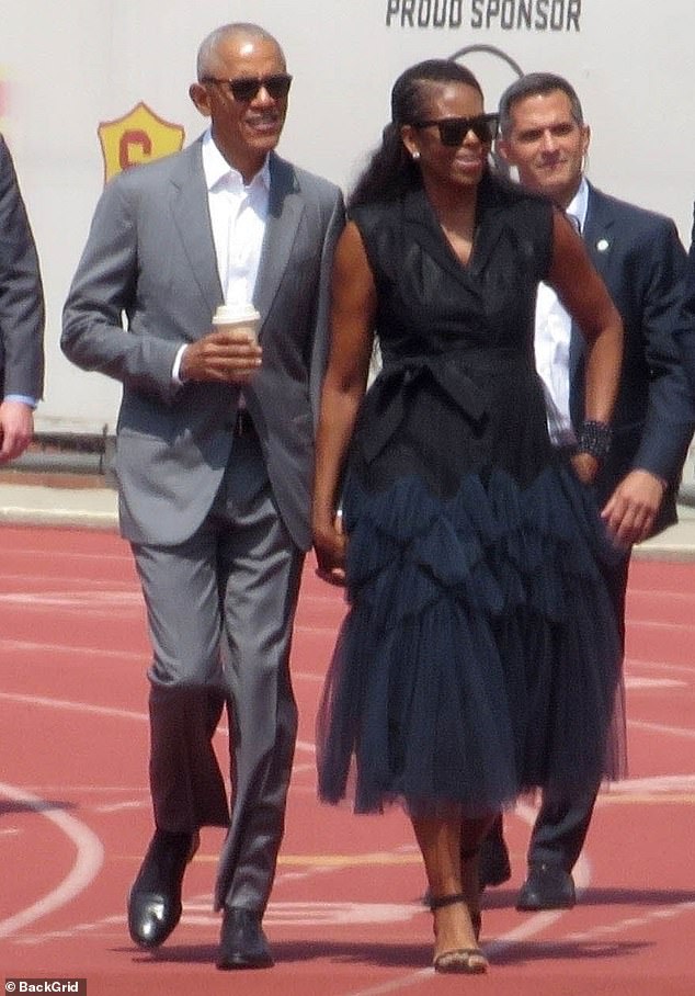 Der ehemalige Präsident Barack Obama und First Lady Michelle Obama strahlten vor Stolz