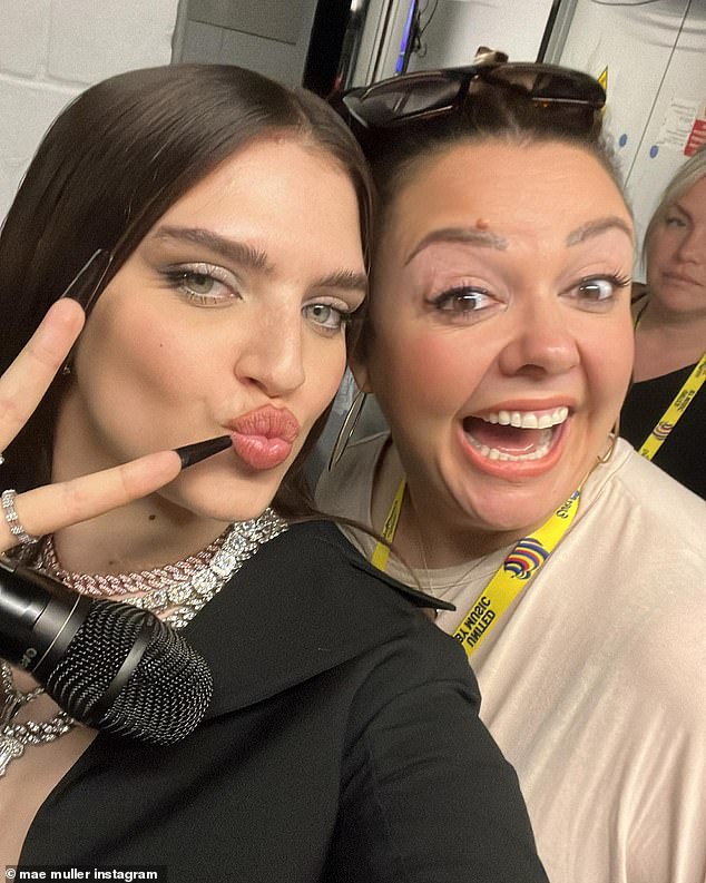 Coach: She also shared a selfie from the same night as she did a peace sign while posing with famous BGT and X-Factor vocal coach Annabel Williams