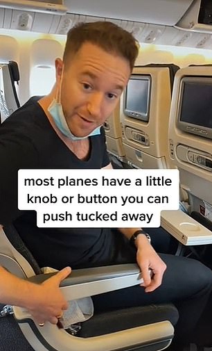 In the video, he shows how on 'most planes' the aisle armrests have hidden buttons or knobs under them