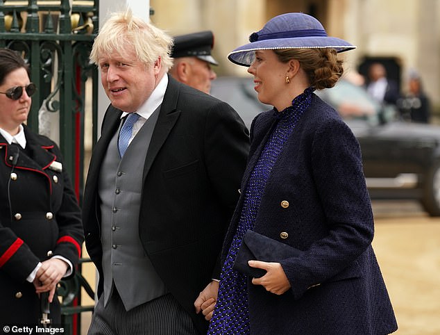 Boris Johnson und seine Frau Carrie Johnson kommen zur Krönung von König Charles III