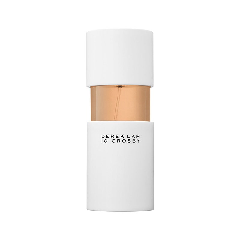 Eine Parfümflasche aus weißem und klarem Glas des Derek Lam 10 Crosby Afloat Eau de Parfum auf weißem Hintergrund